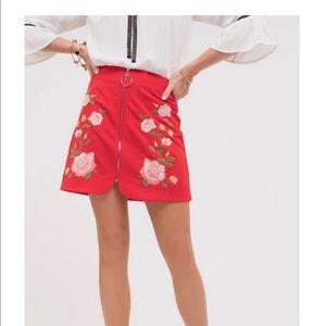 New with tags. Red zipper floral embroidered skirt